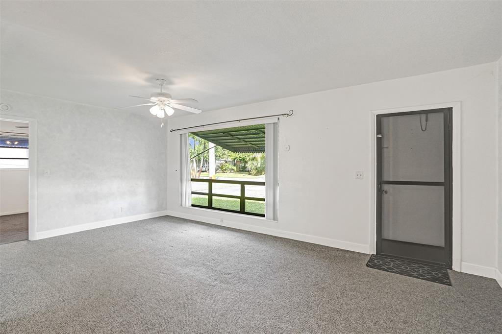 4738 Northwest 5th Street Plantation, FL 33317 - Photo 18 of 68 an empty room with windows and closet