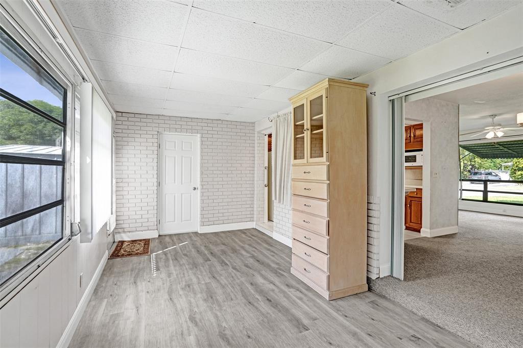 4738 Northwest 5th Street Plantation, FL 33317 - Photo 41 of 68 wooden floor in an empty room with a window