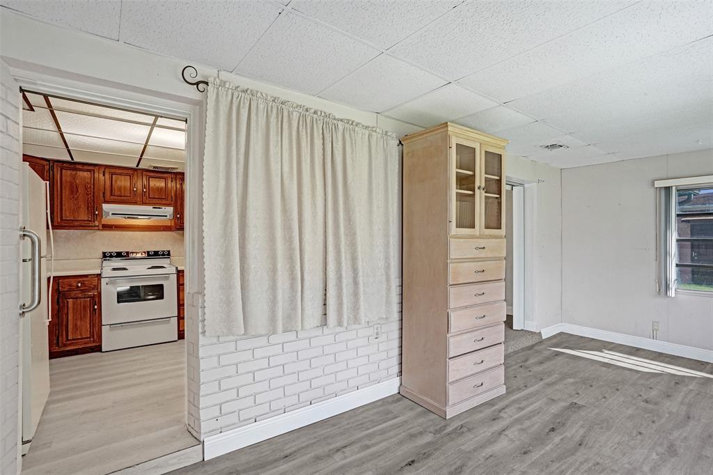 4738 Northwest 5th Street Plantation, FL 33317 - Photo 42 of 68 a view of kitchen with stainless steel appliances wooden floor and window