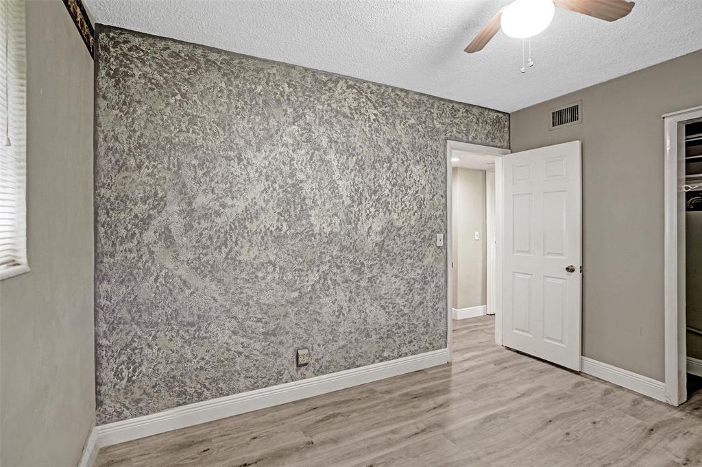 4738 Northwest 5th Street Plantation, FL 33317 - Photo 52 of 68 wooden floor in an empty room