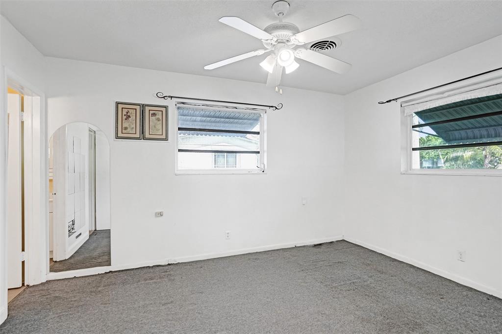 4738 Northwest 5th Street Plantation, FL 33317 - Photo 60 of 68 an empty room with a window