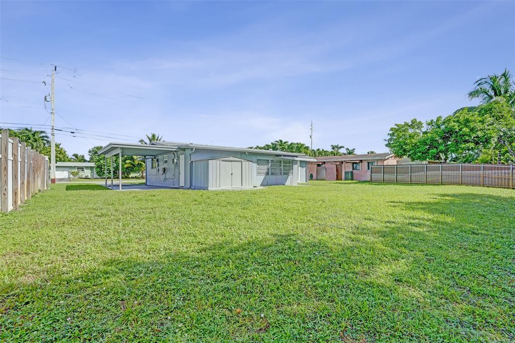 4738 Northwest 5th Street Plantation, FL 33317 - Photo 9 of 68 a view of a house with a outdoor space