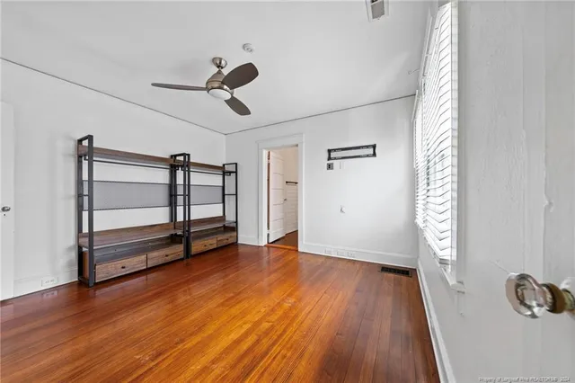 a bathroom with a sink a mirror and shower