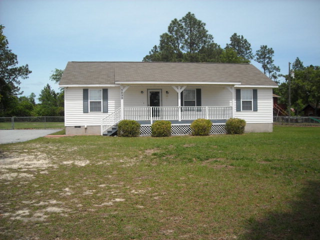 5899 Mt Pleasant Church Road Macon, GA 31216 - Photo 1 of 11 a front view of house with yard