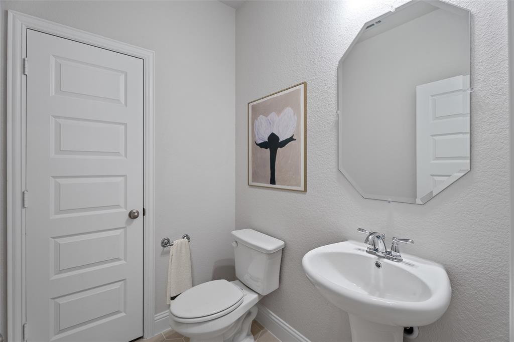 316 Symphony Avenue Forney, TX 75126 - Photo 11 of 17 Beazer Homes Lovers Landing Parker Floorplan. This is not a photo of the actual home, but is a photo of the Parker floorplan.