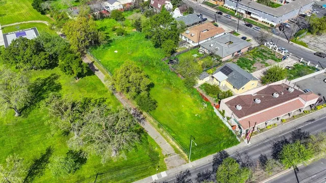 an aerial view of a house with a garden