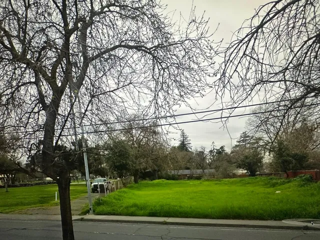 a backyard of a house with lots of green space