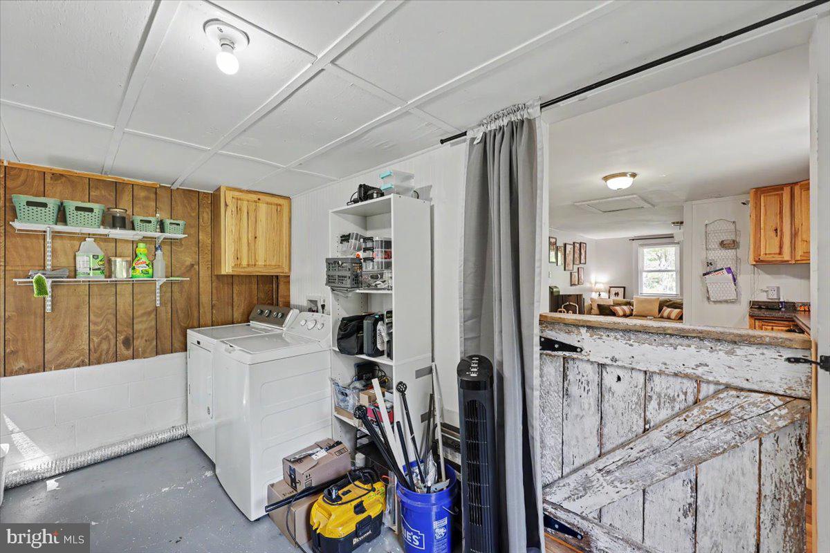 20322 Gum Tree Road Orange, VA 22960 - Photo 14 of 28 Charming laundry nook with rustic flair.