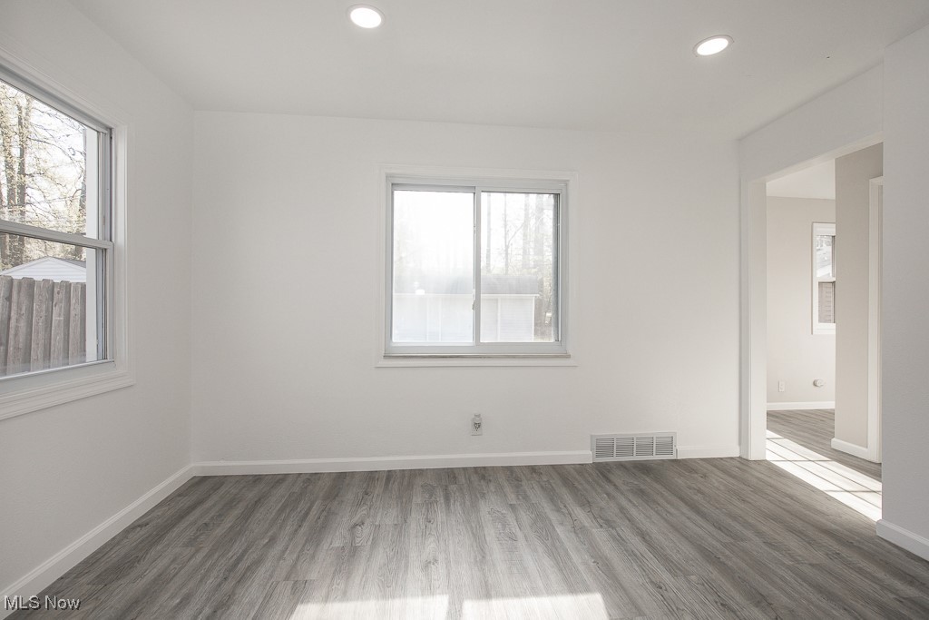 223 Beck Road Avon Lake, OH 44012 - Photo 8 of 29 Dining area featuring baseboards, visible vents, wood finished floors, and recessed lighting