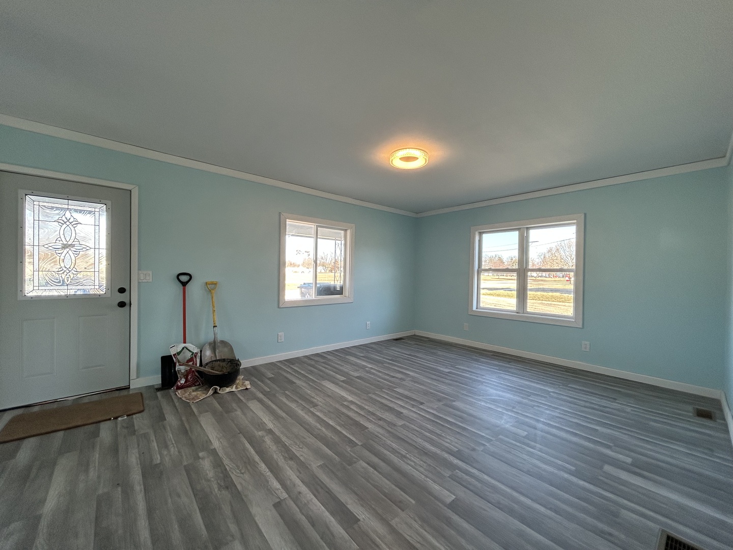 129 West Main Street Amboy, IL 61310 - Photo 20 of 40 a view of a room with gym equipment and a window