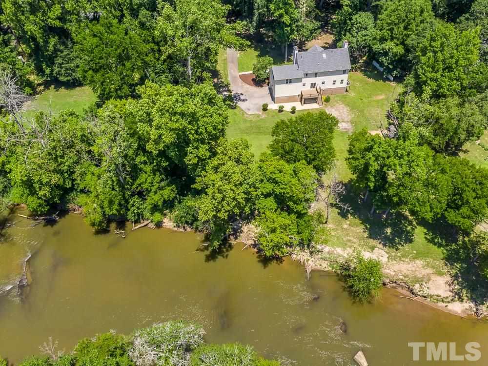 3608 Willow Bluff Drive Raleigh, NC 27604 - Photo 8 of 29 a view of a lake with sitting area