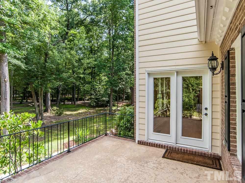 3608 Willow Bluff Drive Raleigh, NC 27604 - Photo 9 of 29 a view of a backyard with a garden and plants