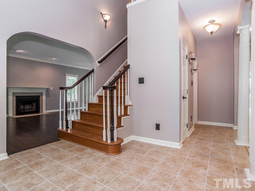 3608 Willow Bluff Drive Raleigh, NC 27604 - Photo 10 of 29 a view of a hallway with entryway and stairs