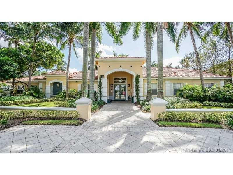 6760 West Sample Road, Unit 6760 Coral Springs, FL 33067 - Photo 3 of 6 a house view with a garden space