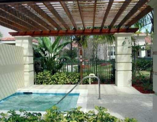 6760 West Sample Road, Unit 6760 Coral Springs, FL 33067 - Photo 6 of 6 a view of a backyard