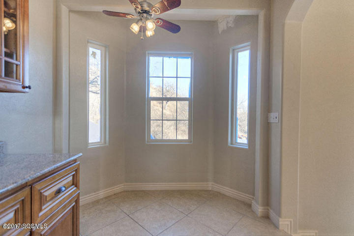 430 Churea Lane Rio Rico, AZ 85648 - Photo 3 of 14 a view of an empty room with a window