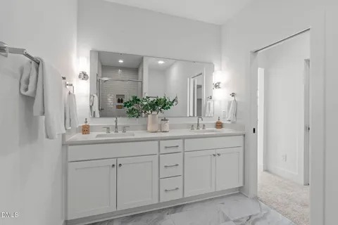 a bathroom with a shower and toilet