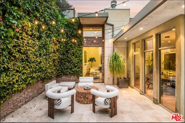 a bathroom with a toilet sink and shower