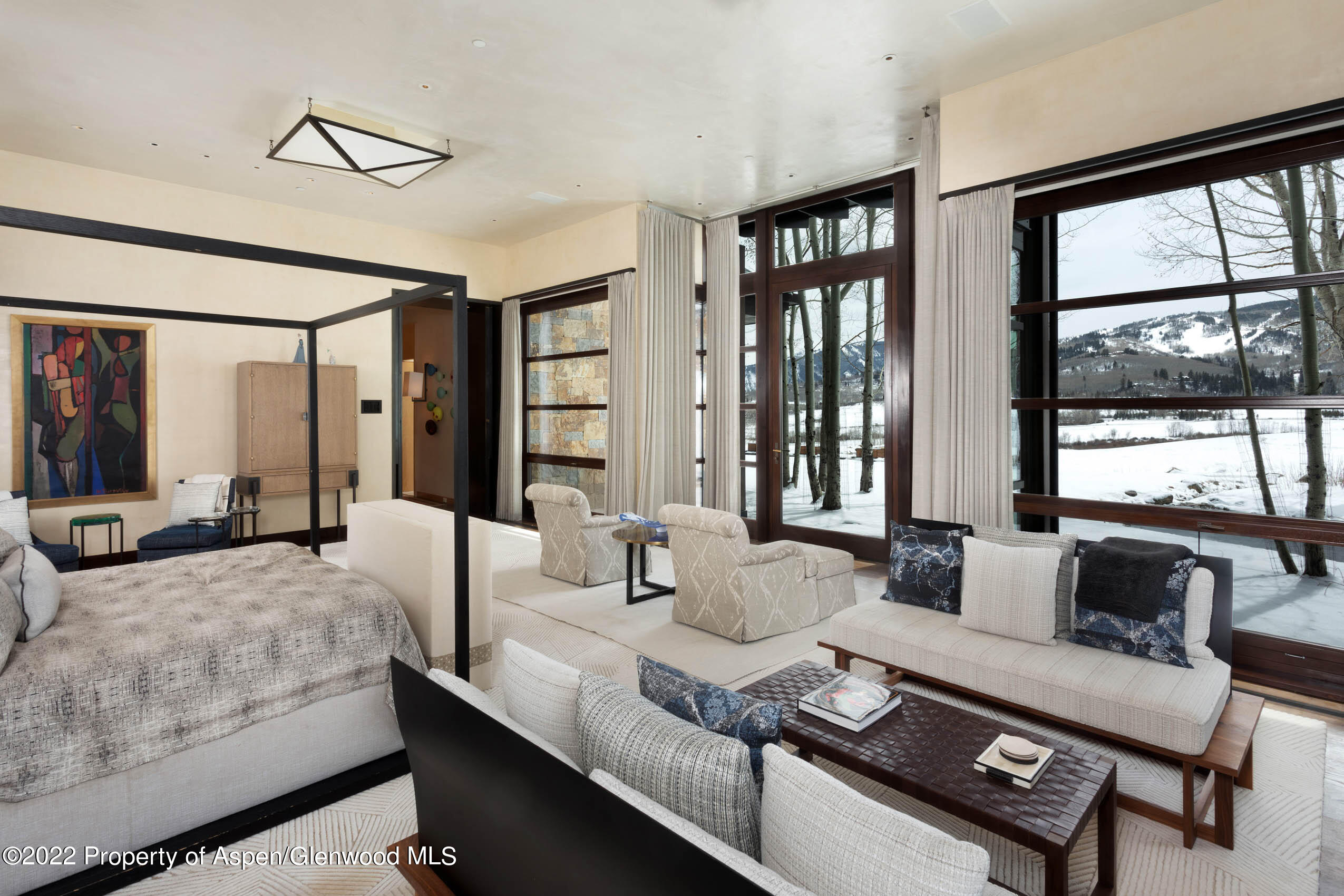 600 Owl Creek Ranch Road Aspen, CO 81611 - Photo 12 of 84 a living room with furniture and a large window