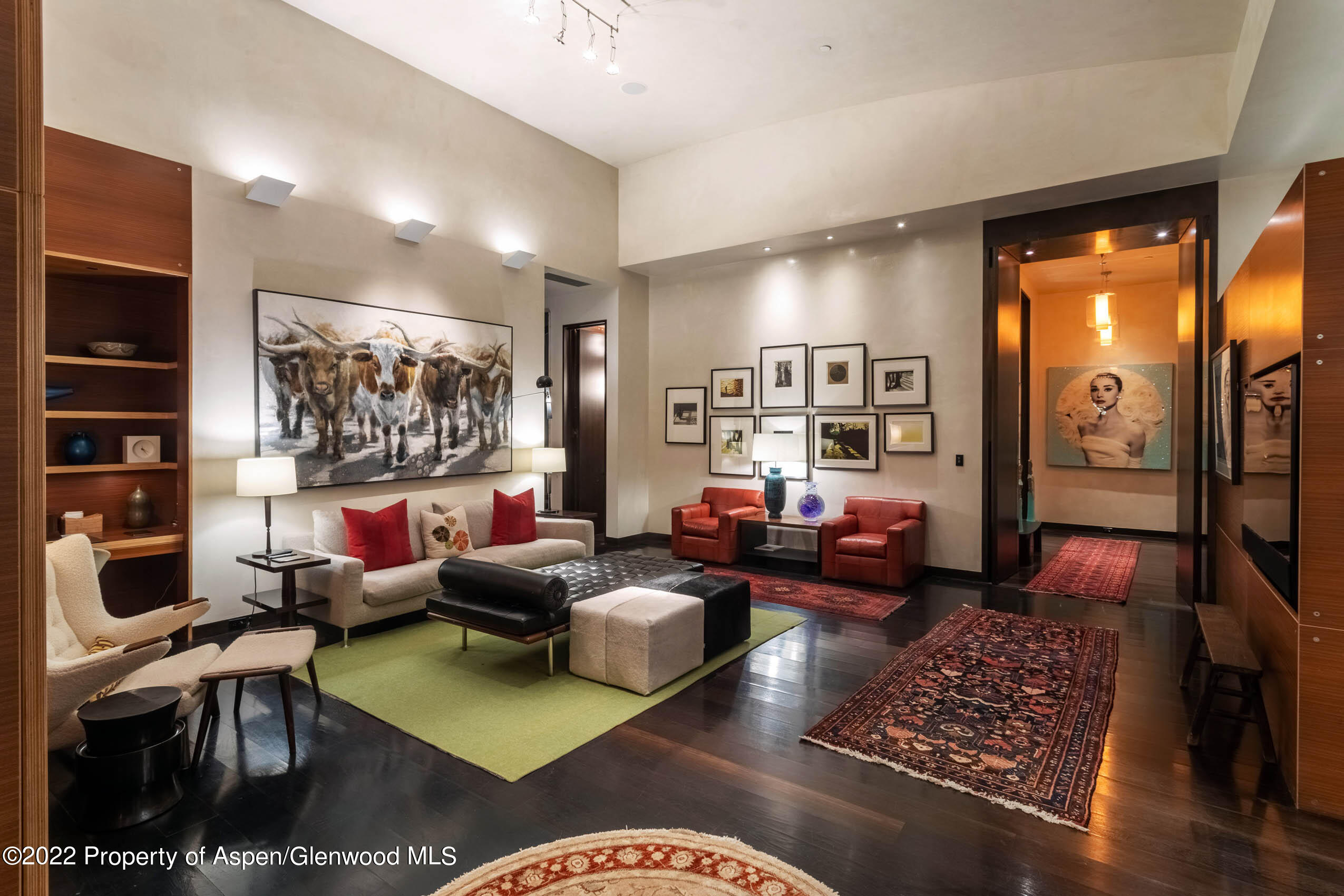 600 Owl Creek Ranch Road Aspen, CO 81611 - Photo 17 of 84 a living room with furniture and a floor to ceiling window