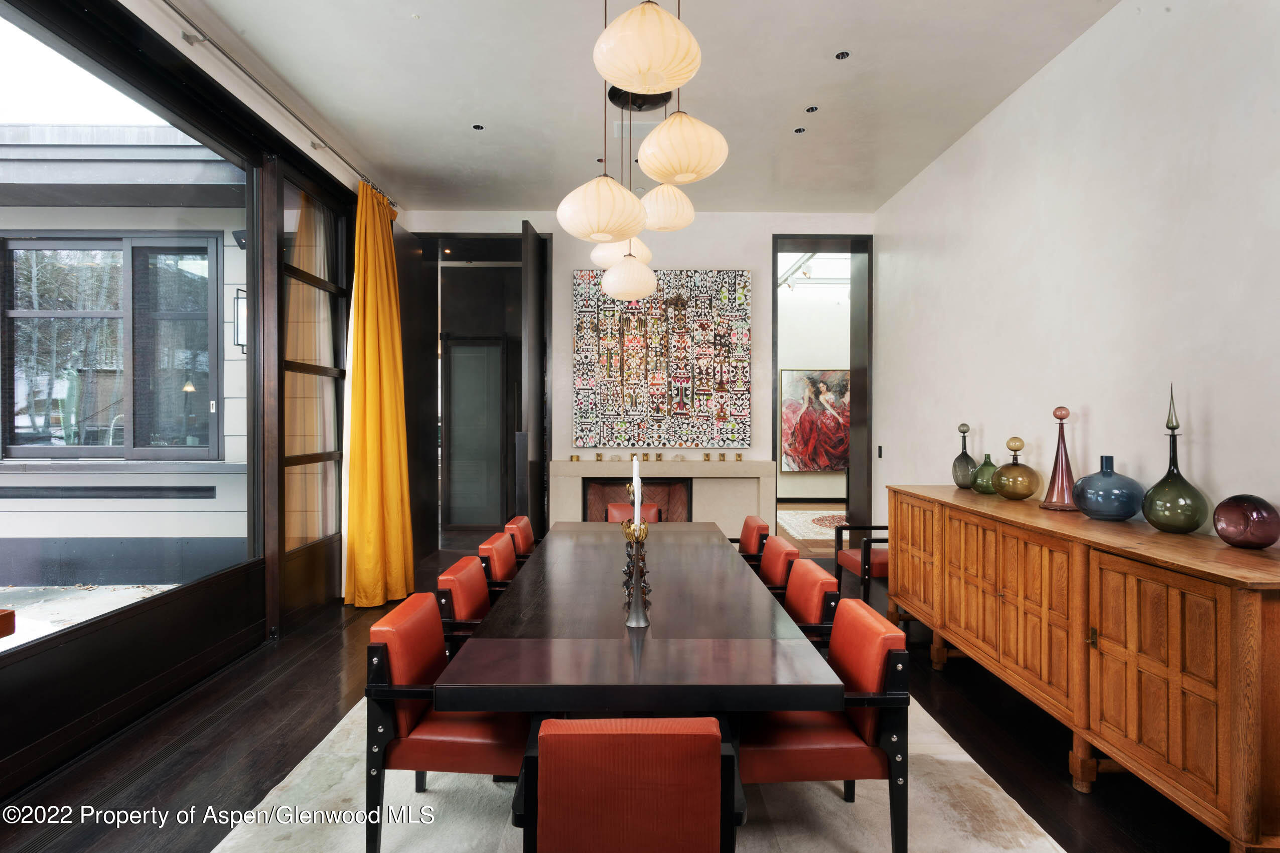 600 Owl Creek Ranch Road Aspen, CO 81611 - Photo 18 of 84 a view of a dining room with furniture window and outside view