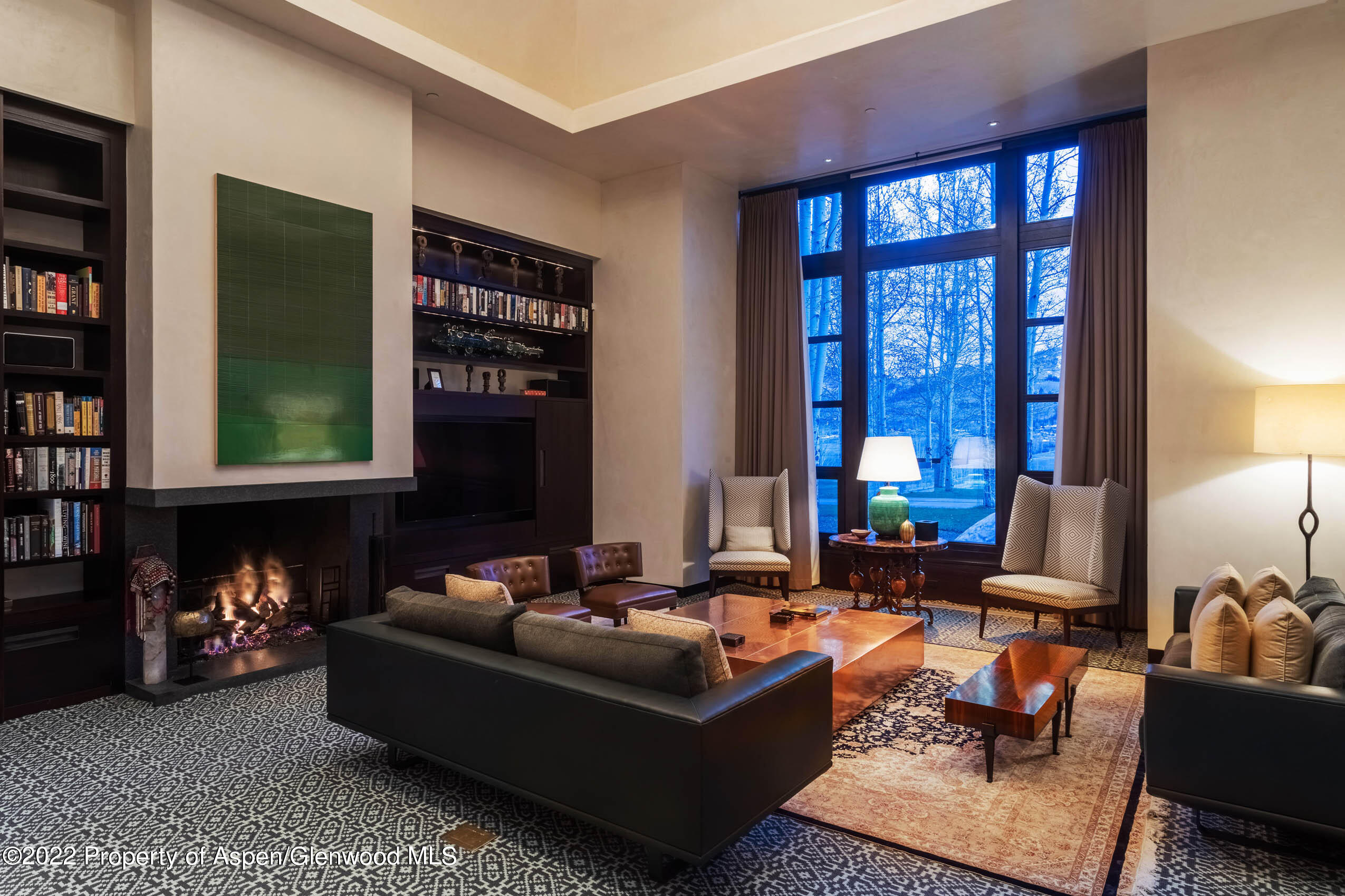 600 Owl Creek Ranch Road Aspen, CO 81611 - Photo 25 of 84 a living room with furniture and a fireplace