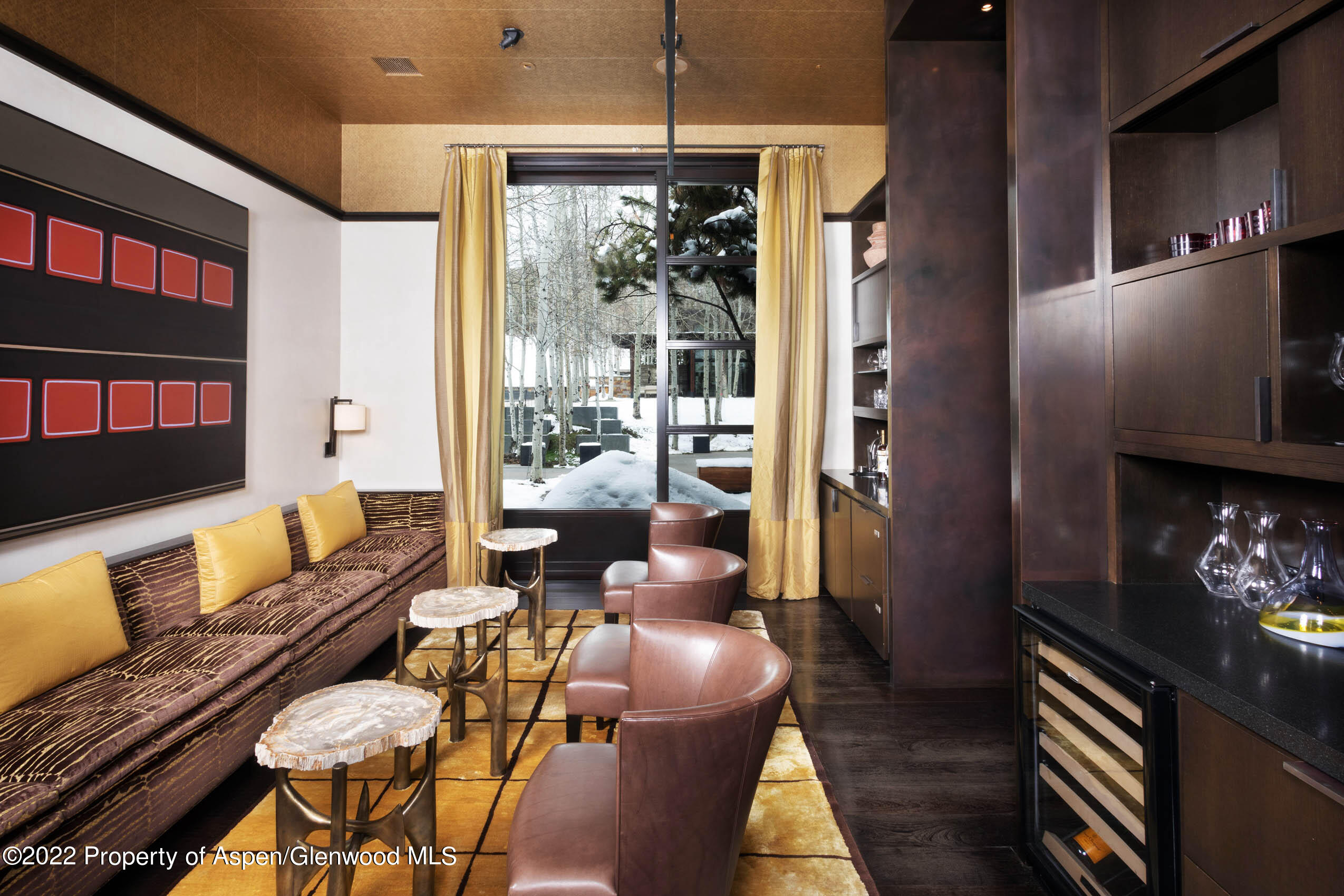 600 Owl Creek Ranch Road Aspen, CO 81611 - Photo 39 of 84 a living room with furniture fireplace and flat screen tv