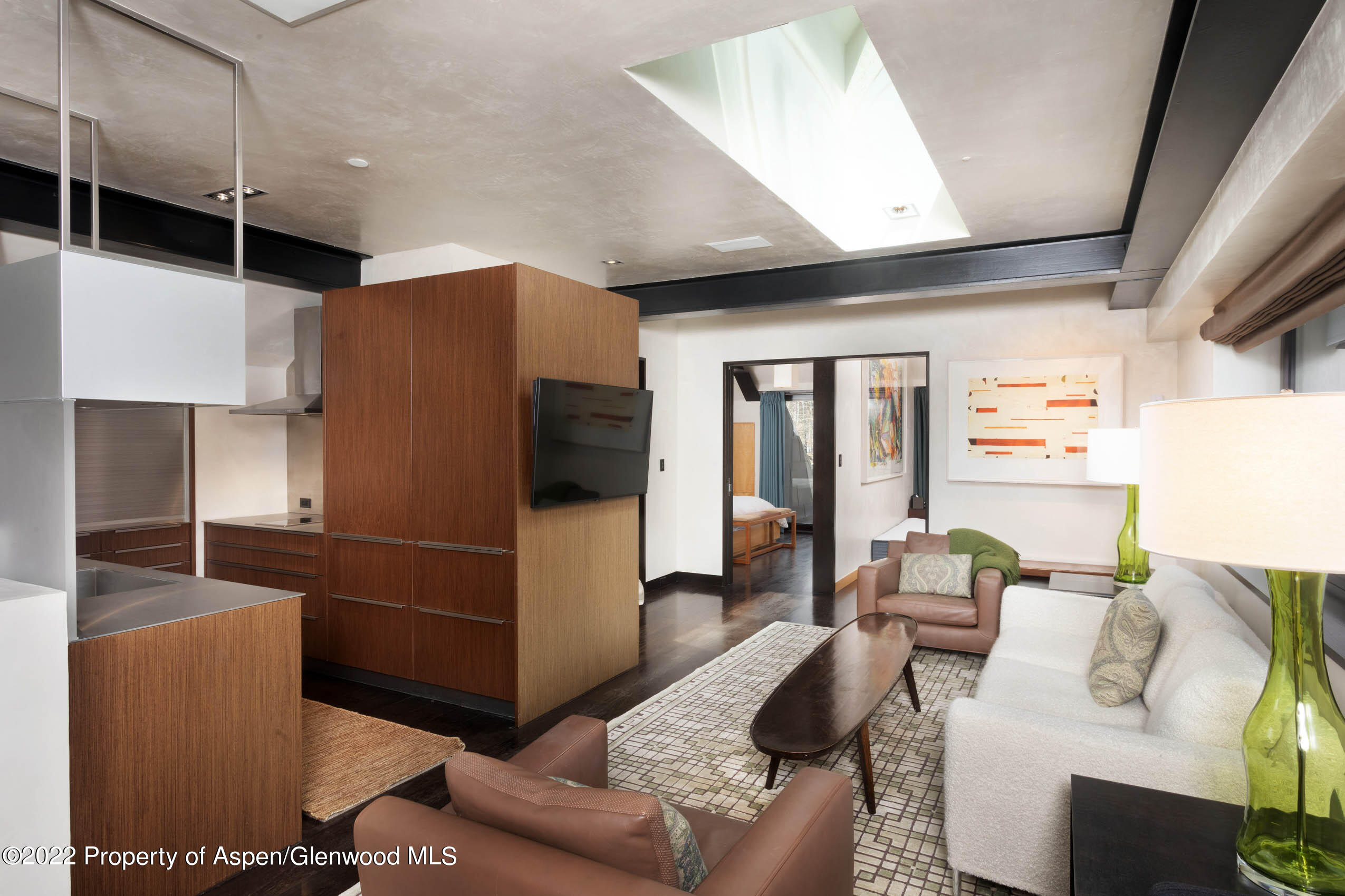 600 Owl Creek Ranch Road Aspen, CO 81611 - Photo 50 of 84 a living room with furniture and a flat screen tv