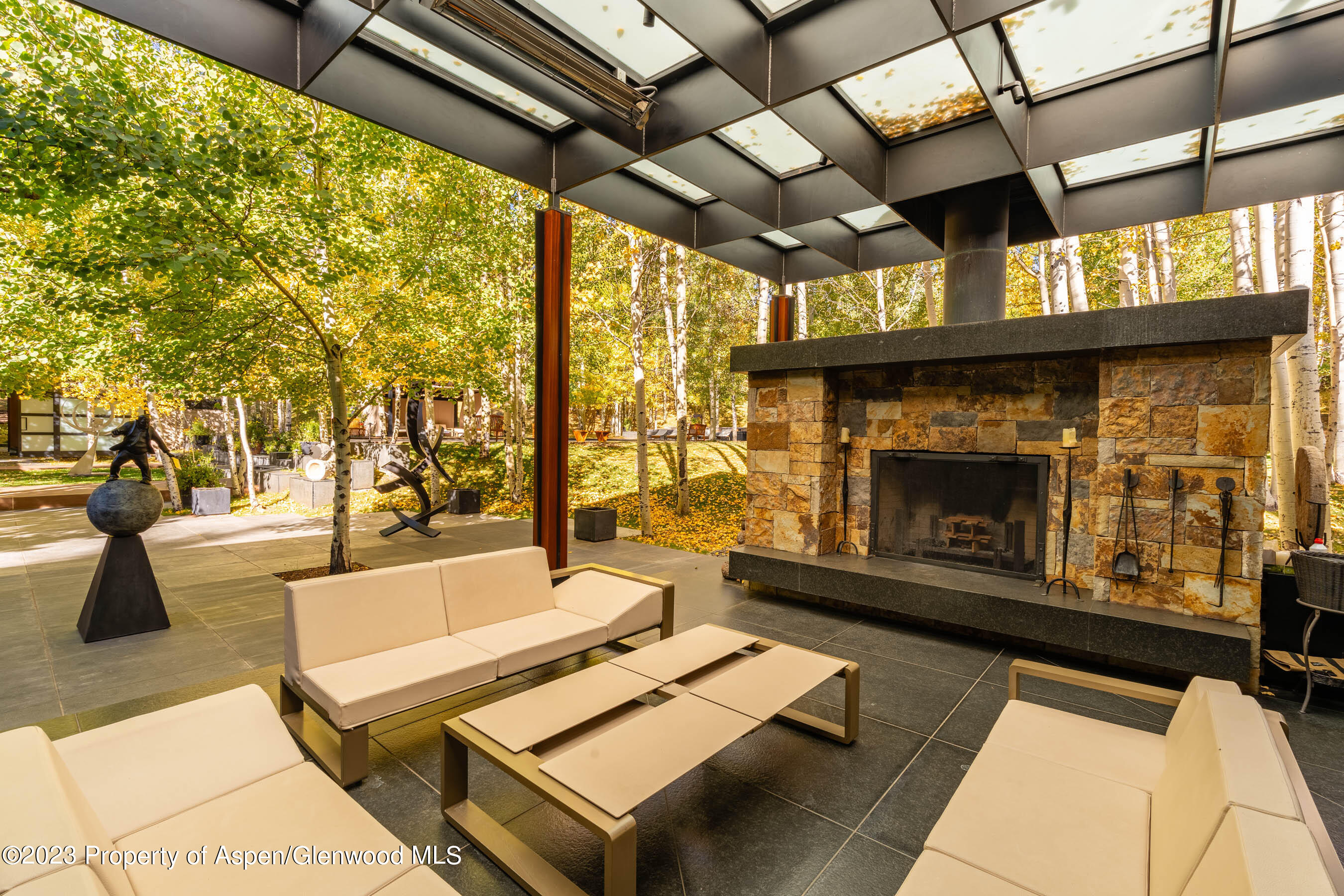 600 Owl Creek Ranch Road Aspen, CO 81611 - Photo 60 of 84 Patio Fireplace and Lounge Area