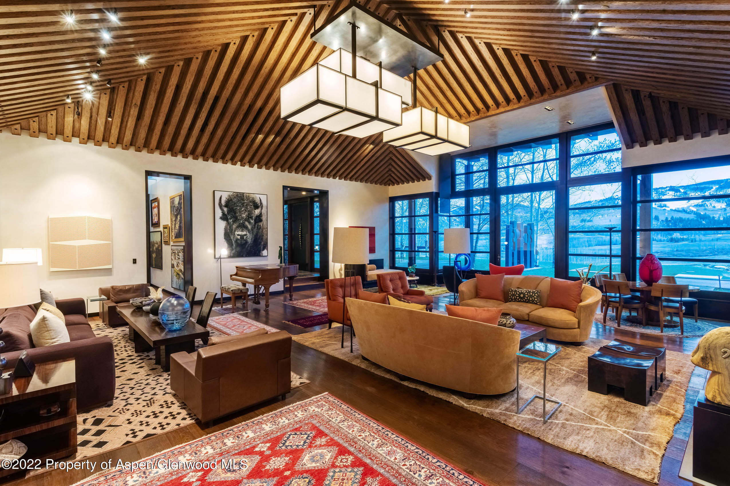 600 Owl Creek Ranch Road Aspen, CO 81611 - Photo 64 of 84 a living room with furniture a ceiling fan and a rug