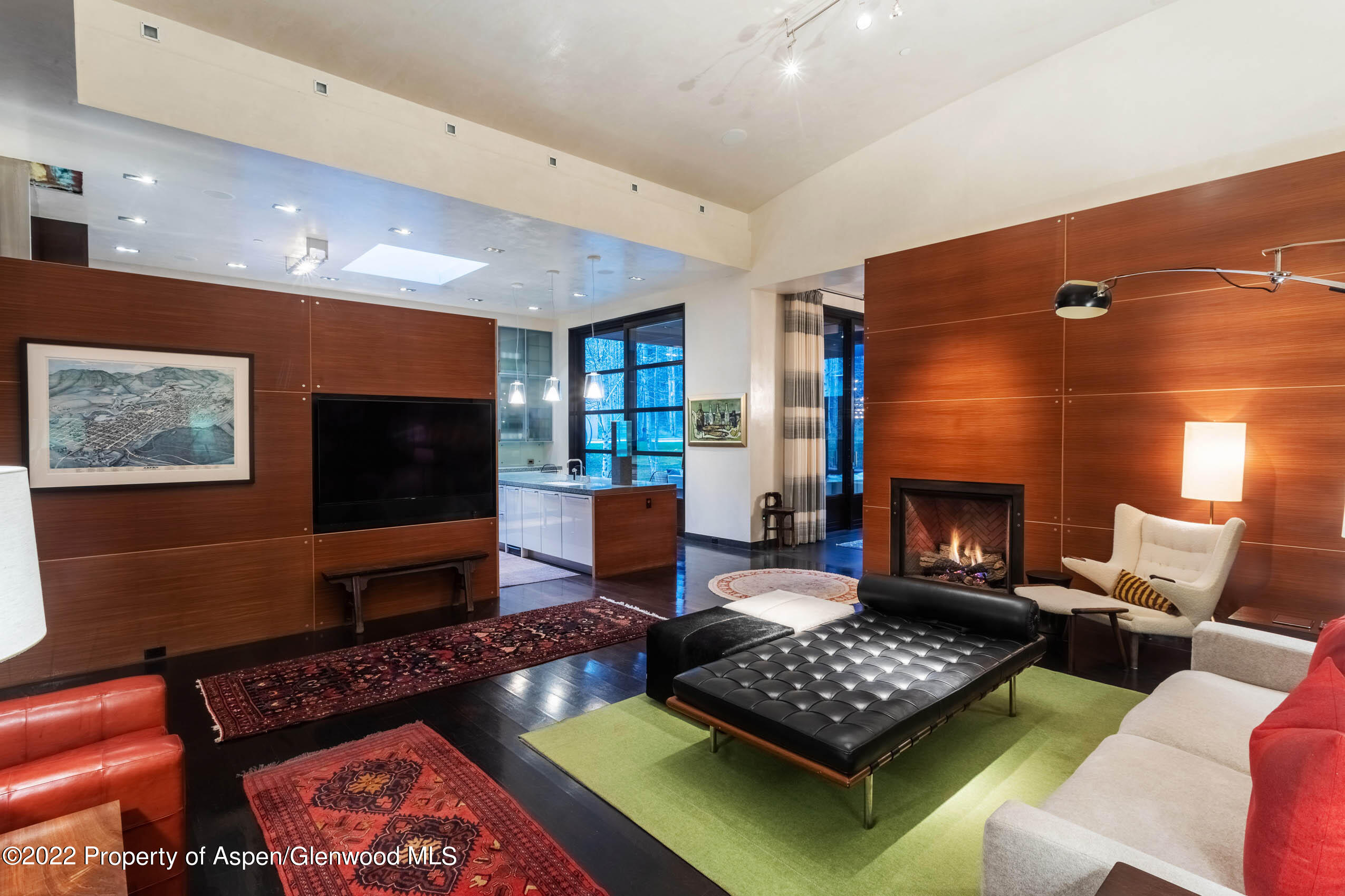 600 Owl Creek Ranch Road Aspen, CO 81611 - Photo 67 of 84 a living room with furniture and a fireplace