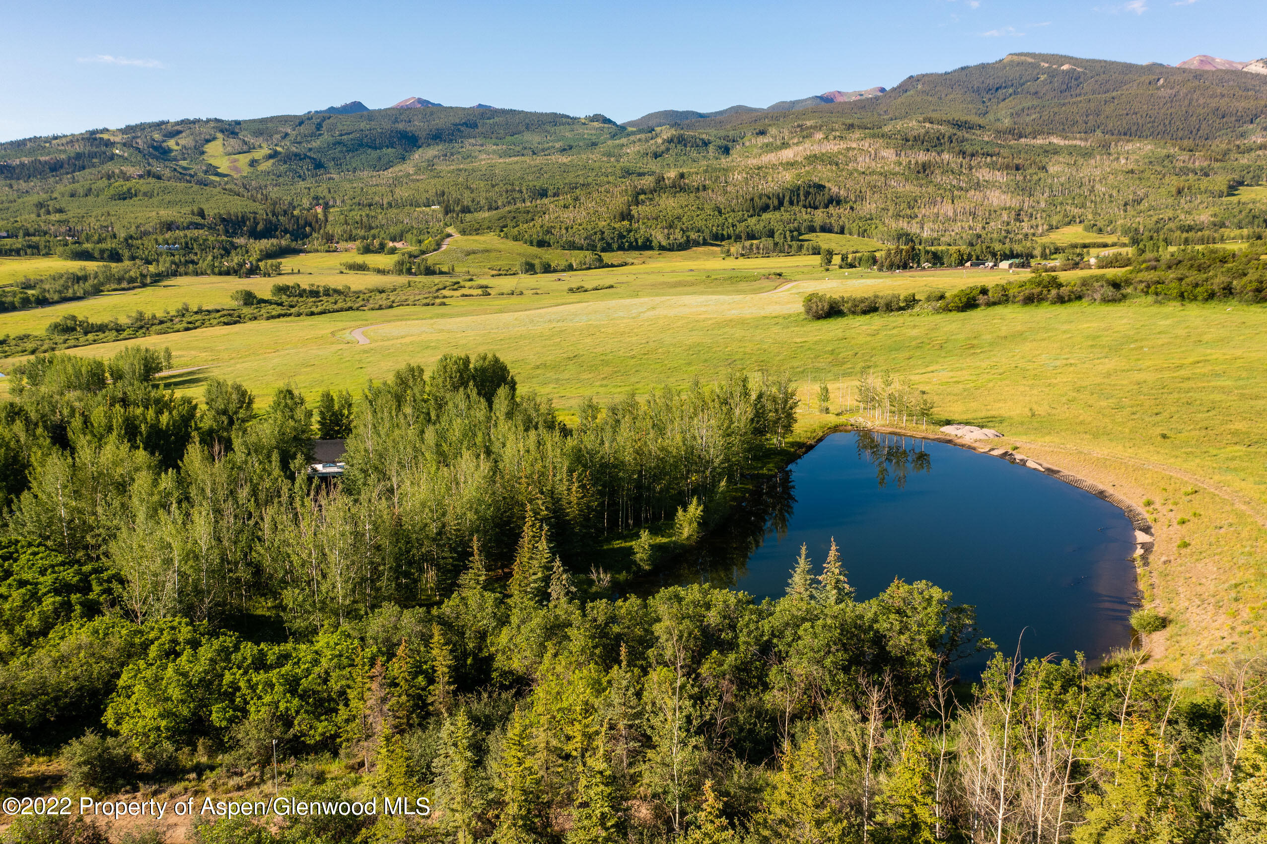 600 Owl Creek Ranch Road Aspen, CO 81611 - Photo 71 of 84 a view of an ocean and a mountain