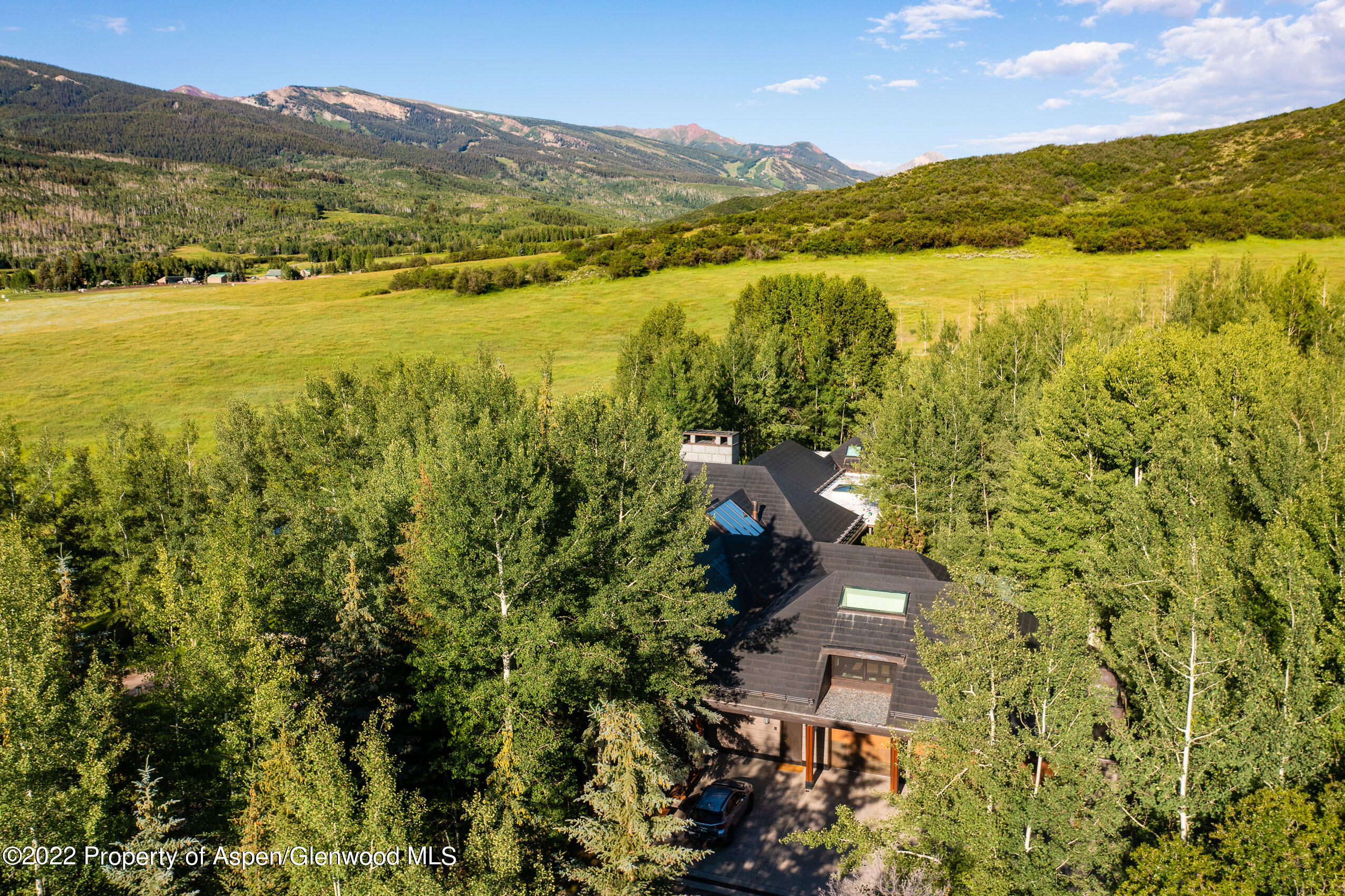 600 Owl Creek Ranch Road Aspen, CO 81611 - Photo 72 of 84 a view of an ocean and a mountain
