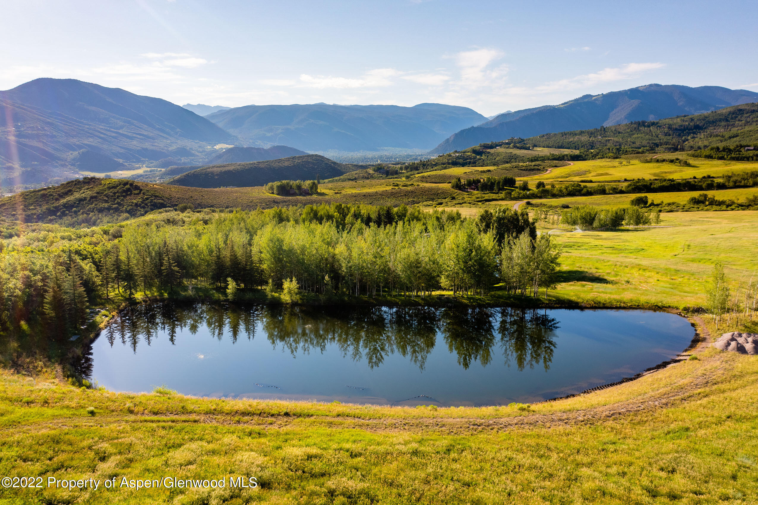600 Owl Creek Ranch Road Aspen, CO 81611 - Photo 76 of 84 Summer aerial of lake