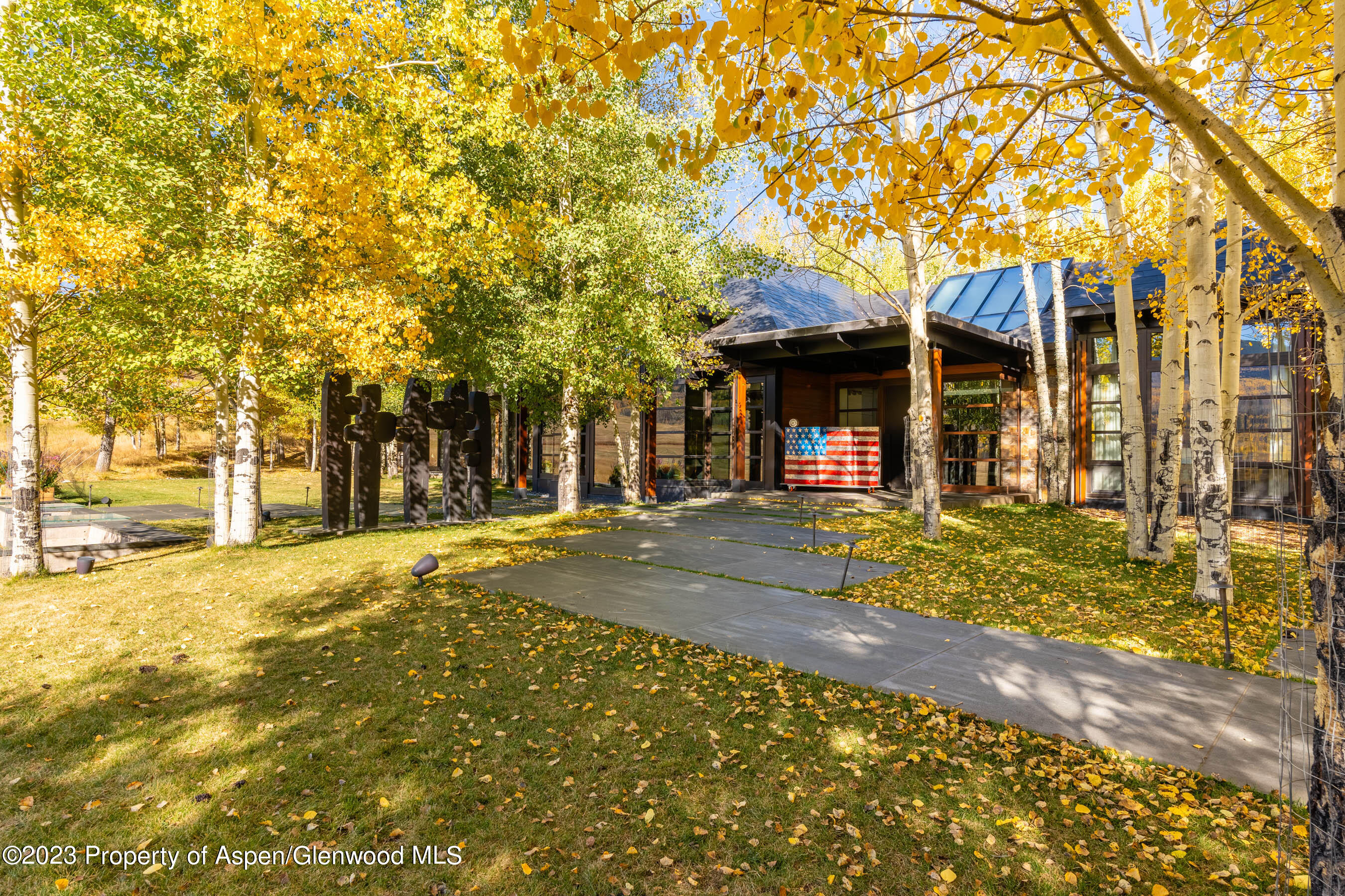 600 Owl Creek Ranch Road Aspen, CO 81611 - Photo 78 of 84 a front view of a house with a large trees