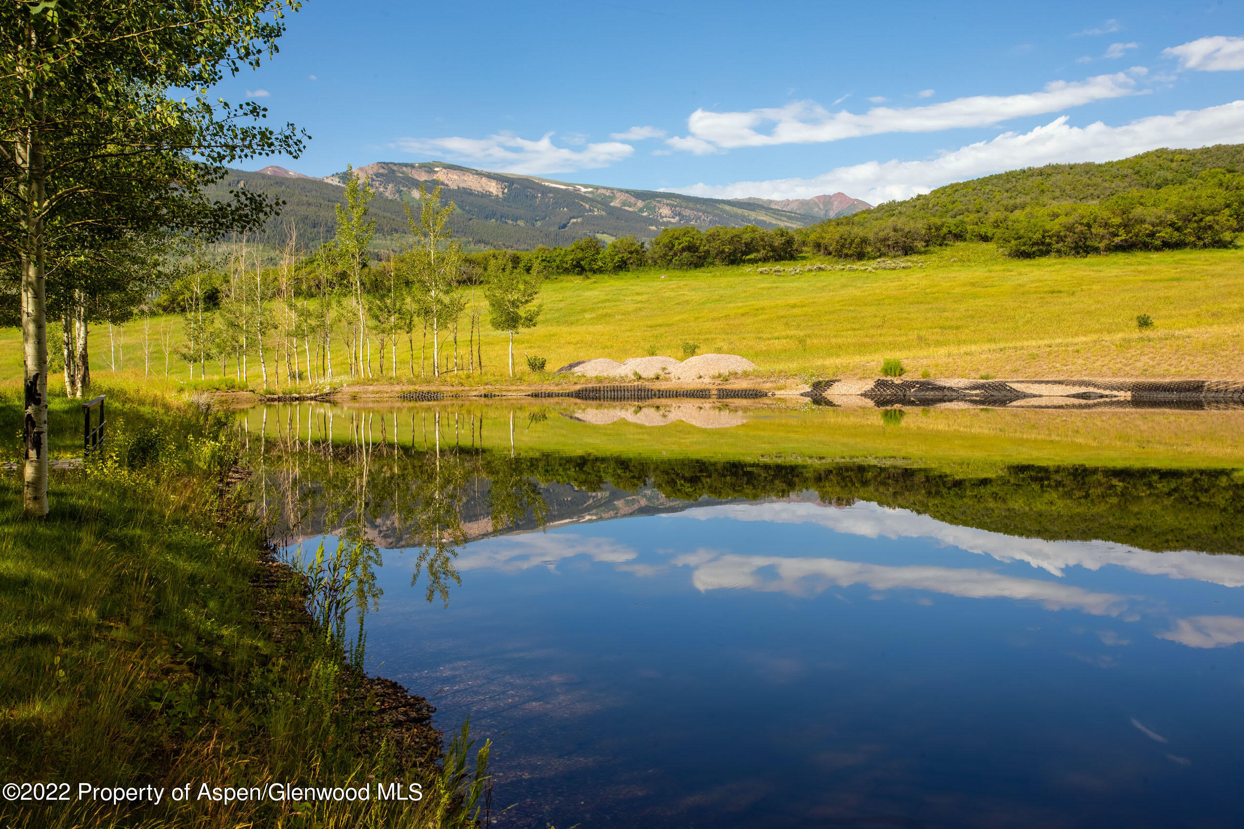 600 Owl Creek Ranch Road Aspen, CO 81611 - Photo 10 of 84 a view of an ocean and beach