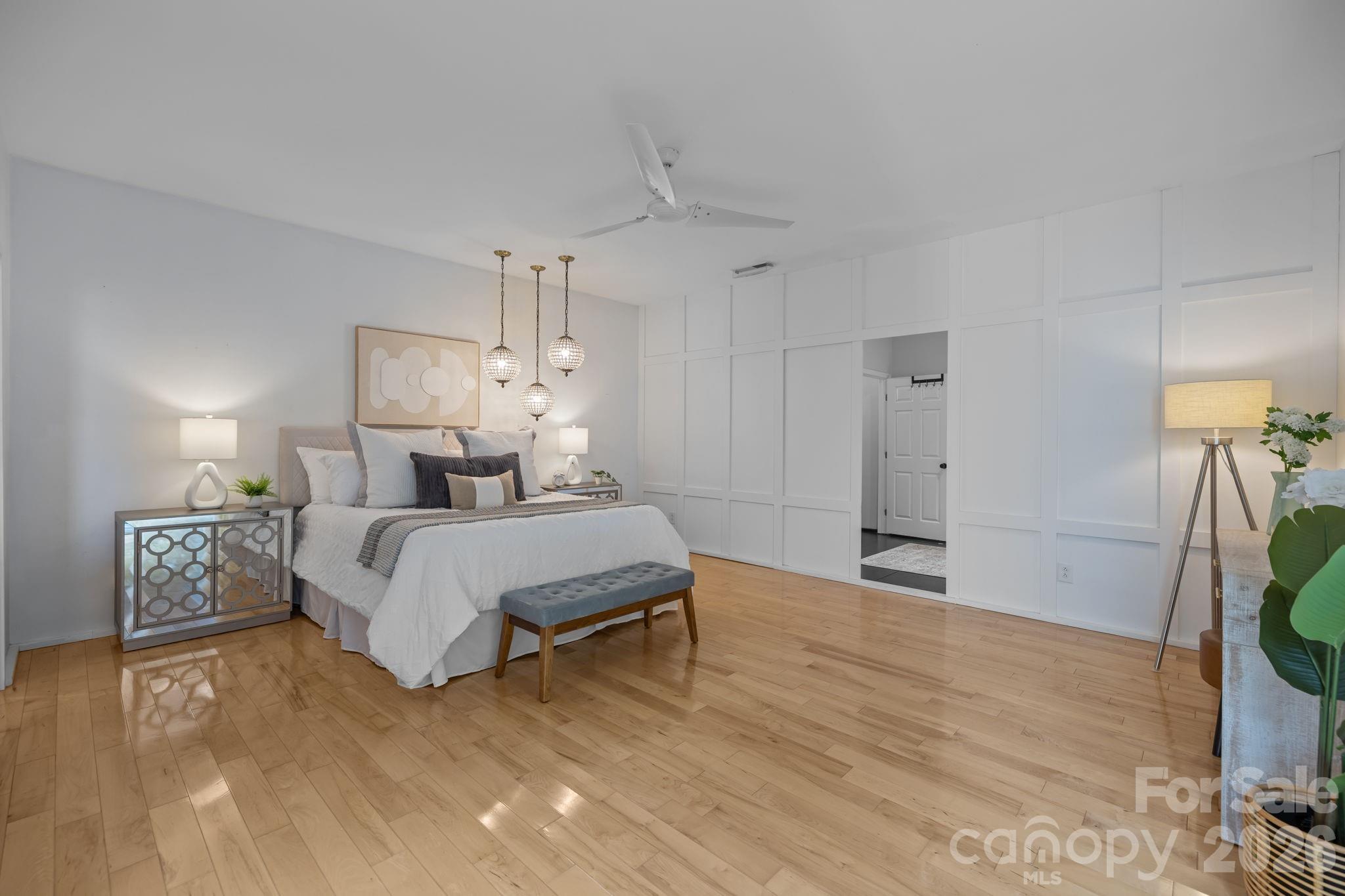 3534 Card Street Charlotte, NC 28205 - Photo 11 of 24 a bedroom with a bed and a wooden floor