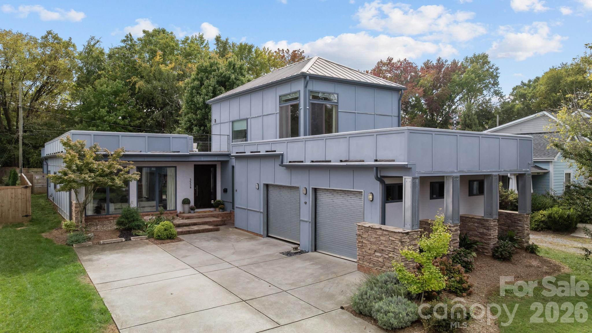 3534 Card Street Charlotte, NC 28205 - Photo 2 of 24 a view of a house with backyard and sitting area