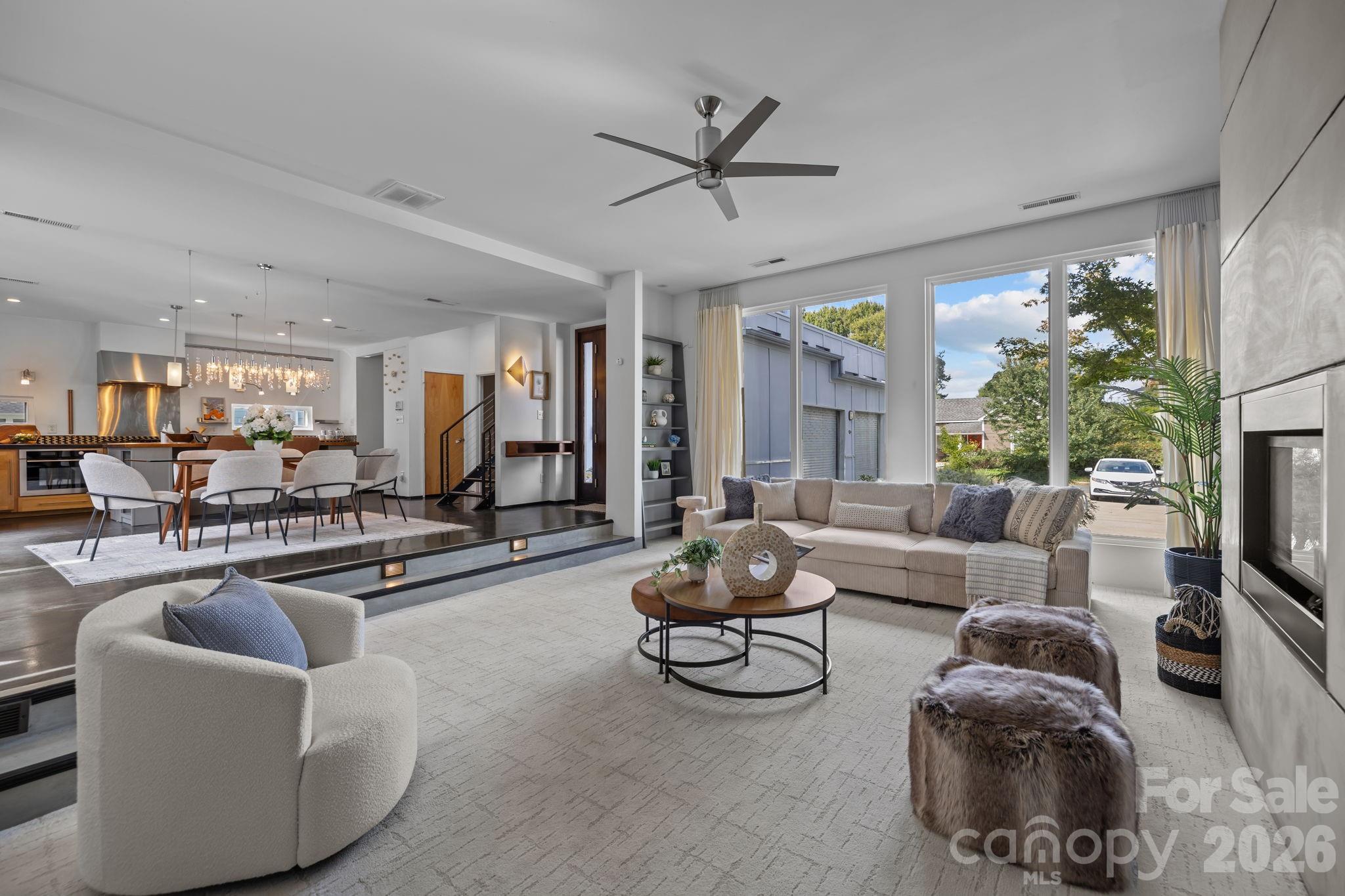 3534 Card Street Charlotte, NC 28205 - Photo 3 of 24 a living room with furniture and a large window