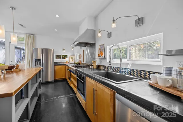 a kitchen with lots of counter space and a sink