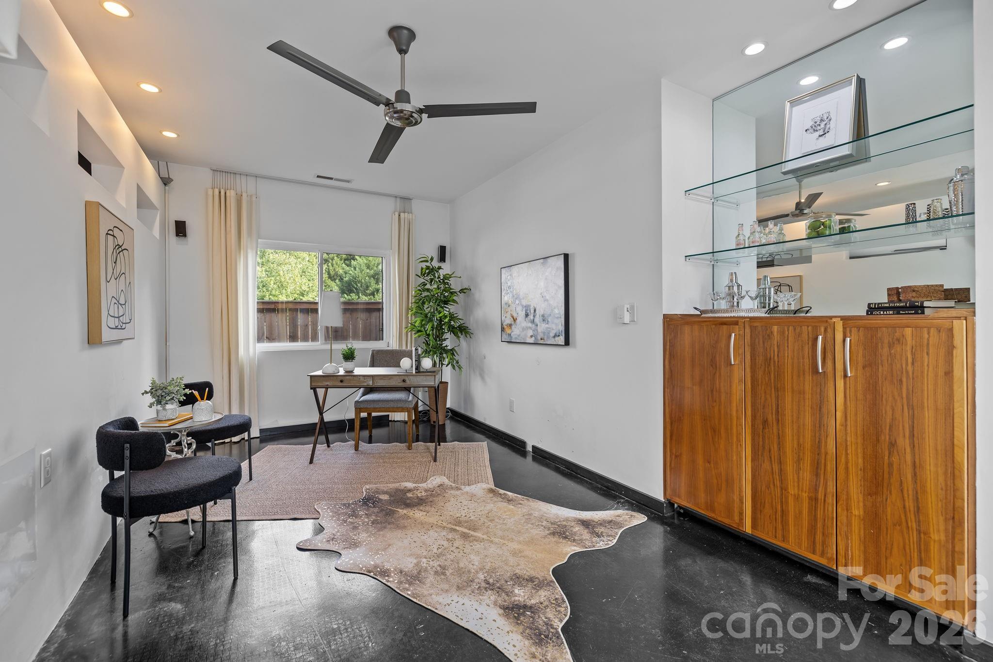 3534 Card Street Charlotte, NC 28205 - Photo 8 of 24 a living room with furniture and a window