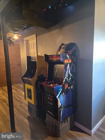 a view of workspace with wooden floor