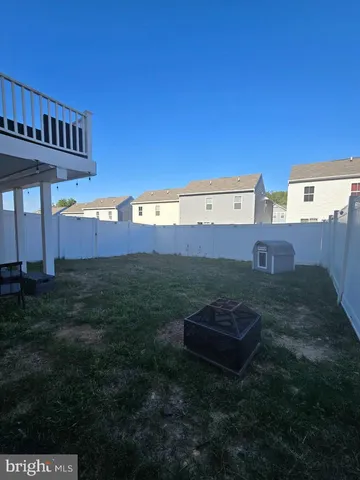 a view of a big yard with potted plants
