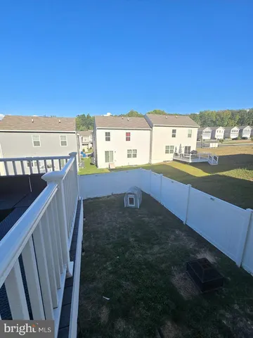 a view of a balcony with an outdoor space