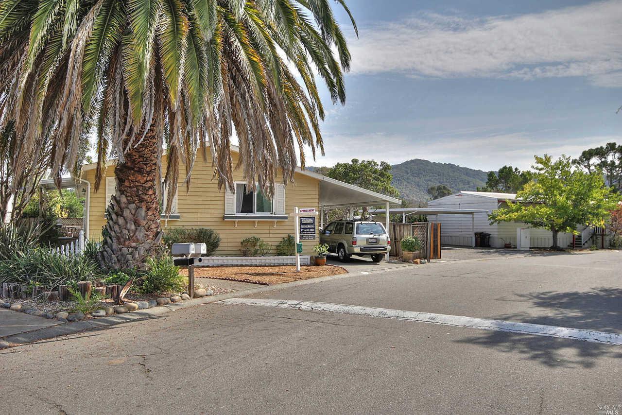 front view of a house with a street