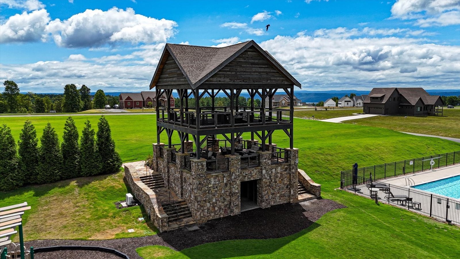 7 A Raulston Fls Road Jasper, TN 37347 - Photo 59 of 66 a view of a table and chairs in the garden
