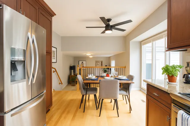 a view of a dining room with furniture window and wooden floor