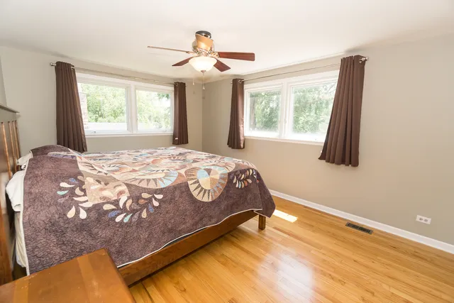 a bathroom with a toilet sink and a mirror