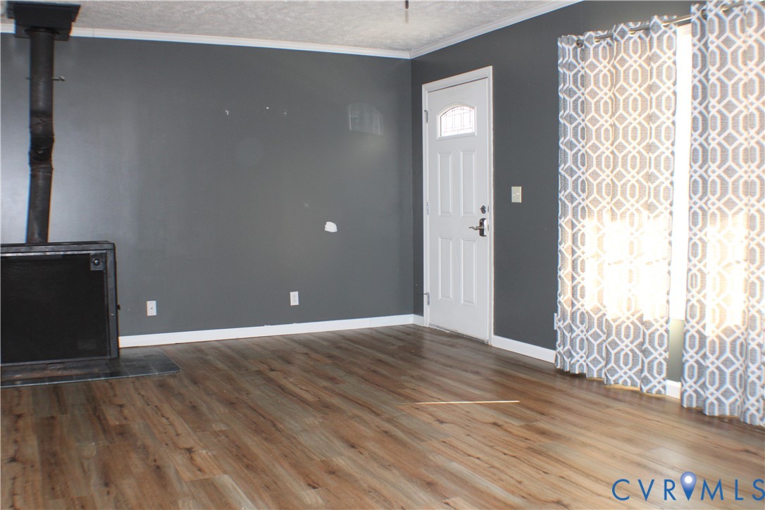 1811 Halls Store Road Mineral, VA 23117 - Photo 15 of 39 Foyer entrance featuring a wood stove, ornamental