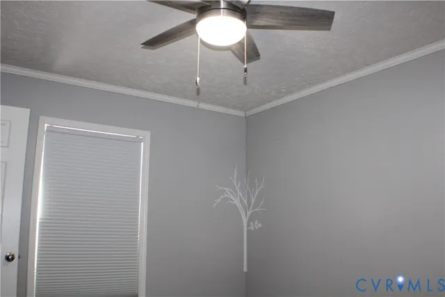 a bathroom with a shower and a chandelier fan